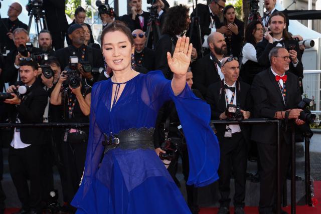 Chinese actress Gong Li arrives for the screening of the film "La Vie d'une femme" (A Woman's Life) at the 79th edition of the Cannes Film Festival in Cannes, southern France on May 13, 2026. (Photo by Valery HACHE / AFP)