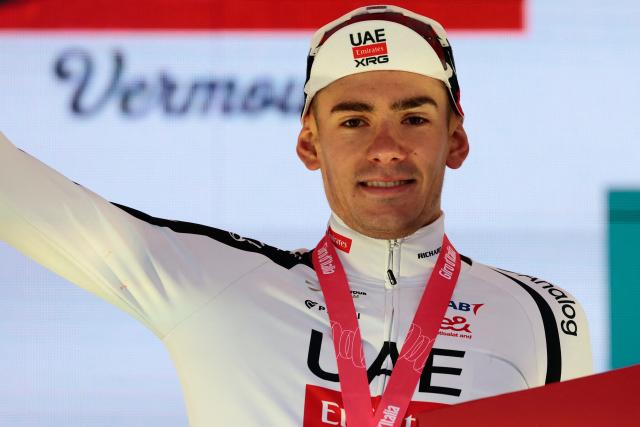 UAE Team Emirates - XRG Spanish rider Igor Arrieta celebrates on the podium after winning the 5th stage of the Giro d'Italia 2026 - Tour of Italy cycling race between Praia a Mare and Potenza, southern Italy on May 13, 2026. (Photo by Luca BETTINI / AFP)