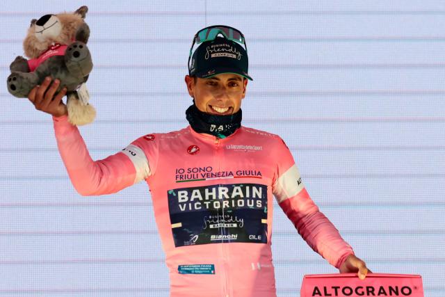 New overall leader Bahrain - Victorious Portuguese rider Afonso Eulalio celebrates on the podium after the 5th stage of the Giro d'Italia 2026 - Tour of Italy cycling race between Praia a Mare and Potenza, southern Italy on May 13, 2026. (Photo by Luca BETTINI / AFP)