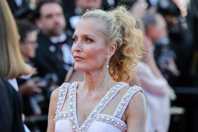US actress Gillian Anderson arrives for the screening of the film "Teenage Sex and Death at Camp Miasma" at the 79th edition of the Cannes Film Festival in Cannes, southern France on May 13, 2026. (Photo by Thibaud MORITZ / AFP)