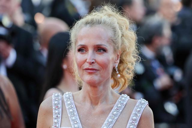 US actress Gillian Anderson arrives for the screening of the film "Teenage Sex and Death at Camp Miasma" at the 79th edition of the Cannes Film Festival in Cannes, southern France on May 13, 2026. (Photo by Thibaud MORITZ / AFP)