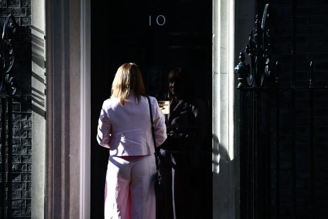Britain's Chancellor of the Exchequer Rachel Reeves waits to enter 10 Downing Street in central London on May 13, 2026. Britain's Prime Minister Keir Starmer, fighting to face down a revolt within his ruling Labour party, has promised his government will be "better" and bolder to assuage disgruntled voters impatient for change. (Photo by Henry NICHOLLS / AFP)