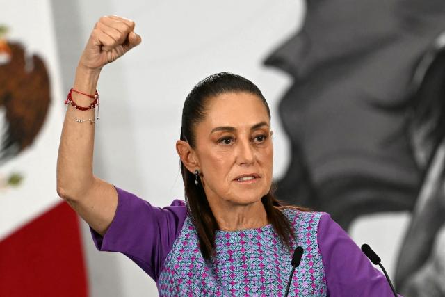 (FILES) Mexico's President Claudia Sheinbaum gestures as she speaks during her daily press conference at the Palacio Nacional in Mexico City on April 30, 2026. Mexican President Claudia Sheinbaum fiercely rejected on May 13, 2026 accusations from a CNN investigation alleging CIA operatives carried out a "targeted assassination" outside Mexico City in March. (Photo by YURI CORTEZ / AFP)