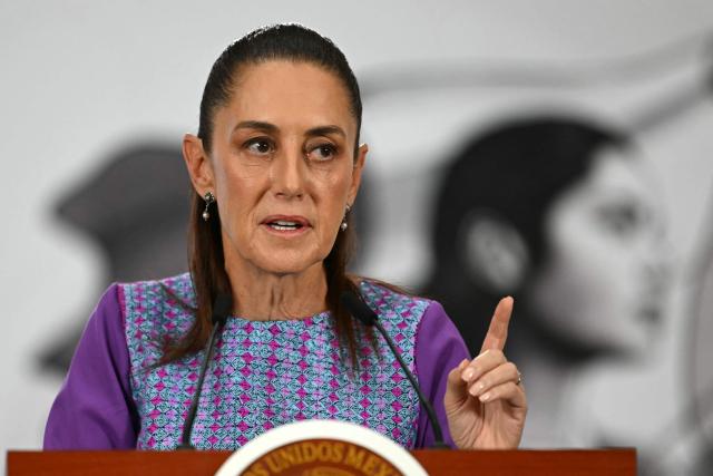 (FILES) Mexico's President Claudia Sheinbaum gestures as she speaks during her daily press conference at the Palacio Nacional in Mexico City on April 30, 2026. Mexican President Claudia Sheinbaum fiercely rejected on May 13, 2026 accusations from a CNN investigation alleging CIA operatives carried out a "targeted assassination" outside Mexico City in March. (Photo by YURI CORTEZ / AFP)