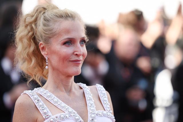 US actress Gillian Anderson arrives for the screening of the film "Teenage Sex and Death at Camp Miasma" at the 79th edition of the Cannes Film Festival in Cannes, southern France on May 13, 2026. (Photo by Valery HACHE / AFP)