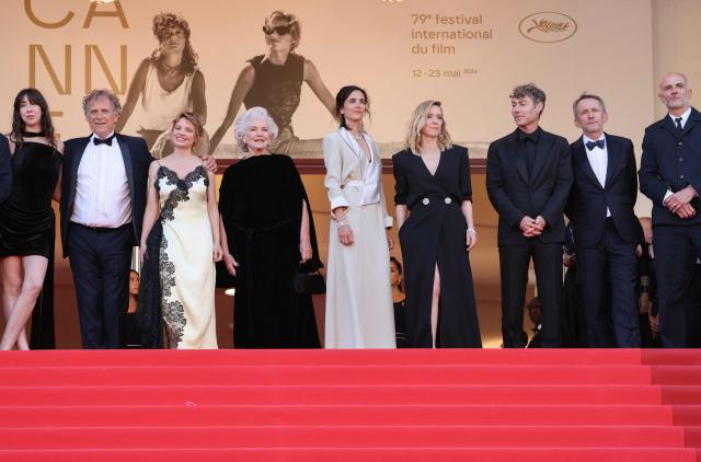 (From L) French actress Suzanne De Baecque, French actor Charles Berling, French actress Melanie Thierry, French actress Marie-Christine Barrault, French director Charline Bourgeois-Tacquet, French actress Lea Drucker, French producer David Thion, French producer Philippe Martin and Belgian film producer Jacques-Henri Bronckart arrive for the screening of the film "La Vie d'une femme" (A Woman's Life) at the 79th edition of the Cannes Film Festival in Cannes, southern France on May 13, 2026. (Photo by Thibaud MORITZ / AFP)