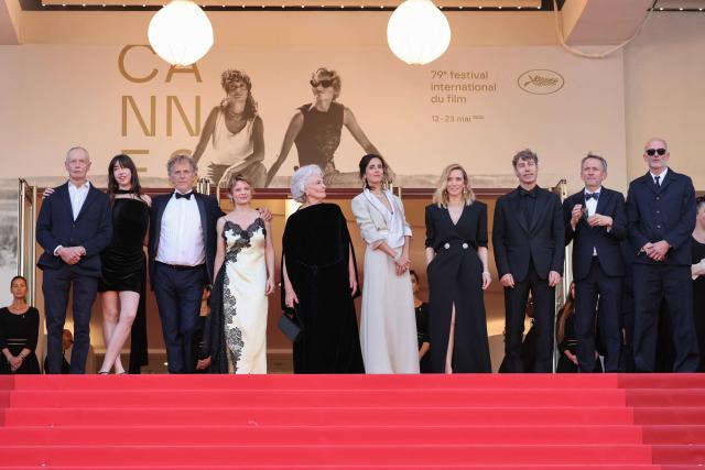 (From L) Italian writer Erri de Luca, French actress Suzanne De Baecque, French actor Charles Berling, French actress Melanie Thierry, French actress Marie-Christine Barrault, French director Charline Bourgeois-Tacquet, French actress Lea Drucker, French producer David Thion, French producer Philippe Martin, Belgian film producer Jacques-Henri Bronckart arrive for the screening of the film "La Vie d'une femme" (A Woman's Life) at the 79th edition of the Cannes Film Festival in Cannes, southern France on May 13, 2026. (Photo by Thibaud MORITZ / AFP)