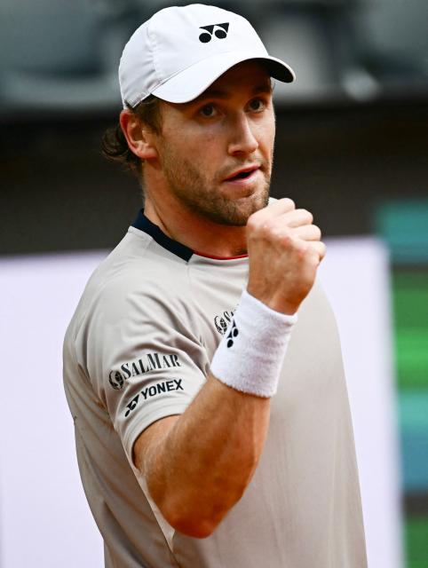 Norway's Casper Ruud celebrates a point against Russia's Karen Khachanov in the ATP Rome Open tennis tournament at Foro Italico in Rome on May 13, 2026. (Photo by Filippo MONTEFORTE / AFP)
