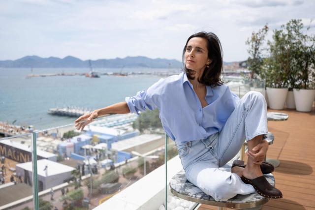 French director Charline Bourgeois-Tacquet poses for a portrait on the 'Terrasse by Albane' located on the roof of The JW Marriott Cannes hotel on the sidelines of the 79th edition of the Cannes Film Festival in Cannes, southern France, on May 13, 2026. (Photo by Anna KURTH / AFP)