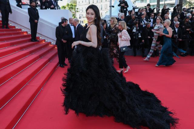 Zhang Da Wan Zi arrives for the screening of the film "La Vie d'une femme" (A Woman's Life) at the 79th edition of the Cannes Film Festival in Cannes, southern France on May 13, 2026. (Photo by Thibaud MORITZ / AFP)