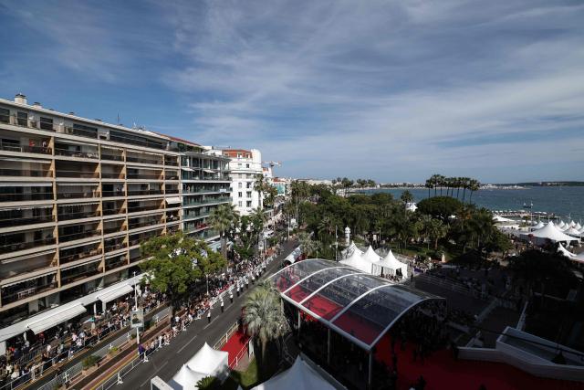 This photograph shows a general view of the red carpet arrival area during the screening of the film "La Vie d'une femme" (A Woman's Life) at the 79th edition of the Cannes Film Festival in Cannes, southern France on May 13, 2026. (Photo by Sameer AL-DOUMY / AFP)