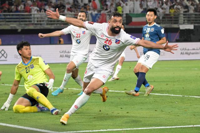 Kuwait SC's Mohamed Marhoon celebrates after scoring his team's second goal during the AFC Challenge League final football match between Kuwait SC and Svay Rieng at the Jaber Al-Mubarak Al-Hamad Stadium in Kuwait City on May 13, 2026. (Photo by Yasser Al-Zayyat / AFP)