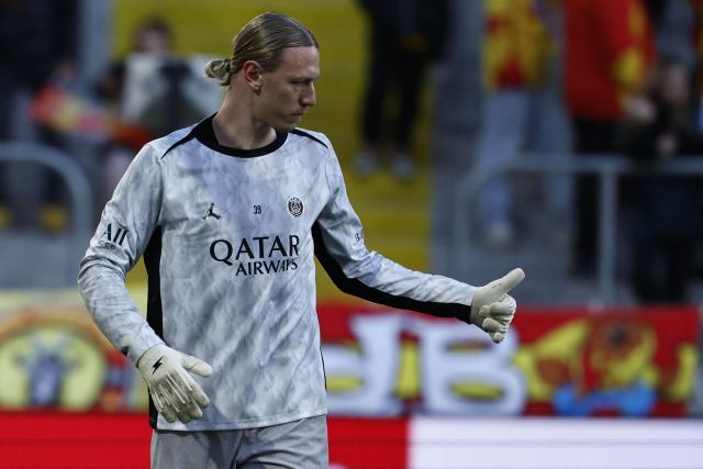 Paris Saint-Germain's Russian goalkeeper #39 Matvey Safonov warms up ahead of the French L1 football match between RC Lens and Paris Saint-Germain (PSG) at the Stade Bollaert-Delelis stadium in Lens on May 13, 2026. (Photo by SIMON WOHLFAHRT / AFP)