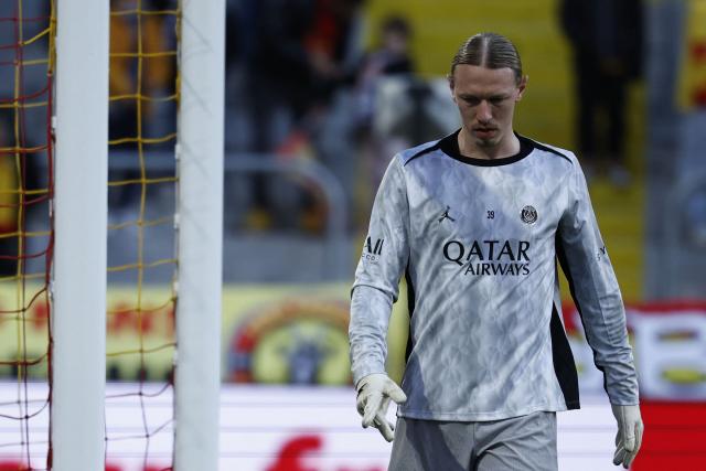 Paris Saint-Germain's Russian goalkeeper #39 Matvey Safonov warms up ahead of the French L1 football match between RC Lens and Paris Saint-Germain (PSG) at the Stade Bollaert-Delelis stadium in Lens on May 13, 2026. (Photo by SIMON WOHLFAHRT / AFP)