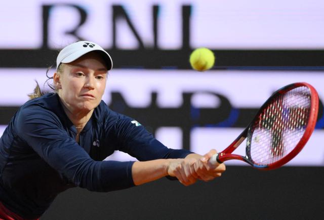Kazakhstan's Elena Rybakina hits a return to Ukraine's Elina Svitolina during the ATP Rome Open tennis tournament at Foro Italico in Rome on May 13, 2026. (Photo by Tiziana FABI / AFP)