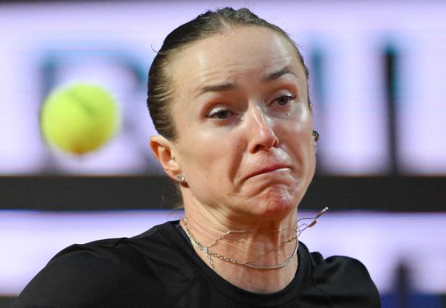 Ukraine's Elina Svitolina hits a return to Kazakhstan's Elena Rybakina during the ATP Rome Open tennis tournament at Foro Italico in Rome on May 13, 2026. (Photo by Tiziana FABI / AFP)
