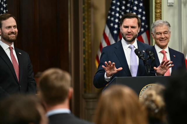 US Vice President JD Vance, alongside Administrator for the Centers for Medicare and  Medicaid Services Mehmet Oz (R) and Federal Trade Commission (FTC) chairman Andrew Ferguson (L), speaks during a press conference on anti-fraud initiatives at the Eisenhower Executive Office building on the White House campus in Washington, DC, on May 13, 2026. (Photo by Kent NISHIMURA / AFP)