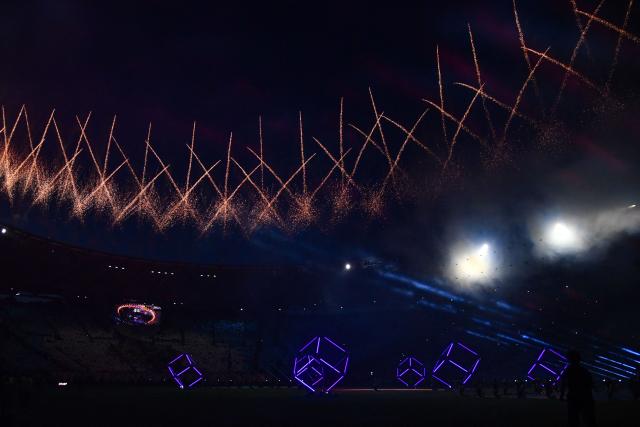 A show and fireworks display takes place prior to the Italian Cup (Coppa Italia) final football match between Lazio Rome and Inter Milan at the Olympic stadium in Rome on May 13, 2026. (Photo by Isabella BONOTTO / AFP)