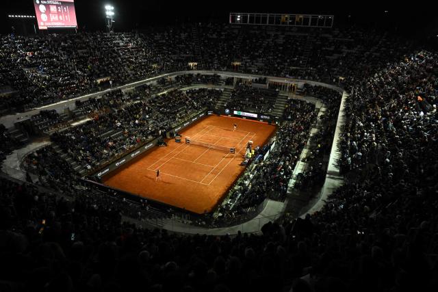 Ukraine's Elina Svitolina serves to Kazakhstan's Elena Rybakina during the ATP Rome Open tennis tournament at Foro Italico in Rome on May 13, 2026. (Photo by Tiziana FABI / AFP)