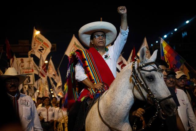 (FILES) Peru's presidential candidate Roberto Sanchez, for the Juntos por el Peru party, gestures upon arrival on horseback at his closing campaign rally at 2 de Mayo Square in Lima on April 8, 2026. The Peruvian prosecutor’s office has requested a prison sentence of more than five years for presidential candidate Roberto Sanchez on charges of allegedly providing false information to the electoral authority regarding campaign contributions between 2018 and 2020, the Public Prosecutor’s Office announced on May 13, 2026 . (Photo by Ernesto BENAVIDES / AFP)