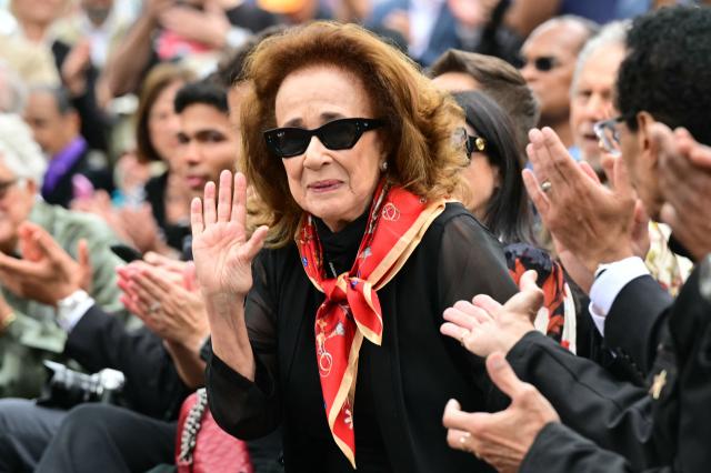 Arice Da Costa waves as she attends her husband's Brazilian percussionist Paulinho da Costa Walk of Fame star ceremony in Hollywood, California on May 13, 2026. (Photo by Frederic J. Brown / AFP)