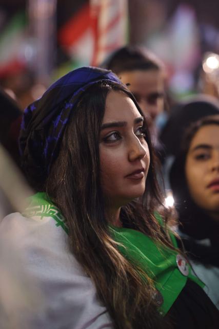People gather to attend the farewell ceremony of Iran's national football team ahead of their departure for the 2026 FIFA World Cup, in Tehran on May 13, 2026. The president of the Iranian Football Federation said late May 9 that if Iran dropped out of the World Cup, it would deprive the country of a "major diplomatic asset". World football's governing body FIFA has insisted for weeks that Iran will take part. Iran, who are due to be based in Tucson, Arizona, during the World Cup, face New Zealand, Belgium and Egypt in Group G. The Iranians open their World Cup campaign against New Zealand in Los Angeles on June 15. (Photo by ATTA KENARE / AFP)