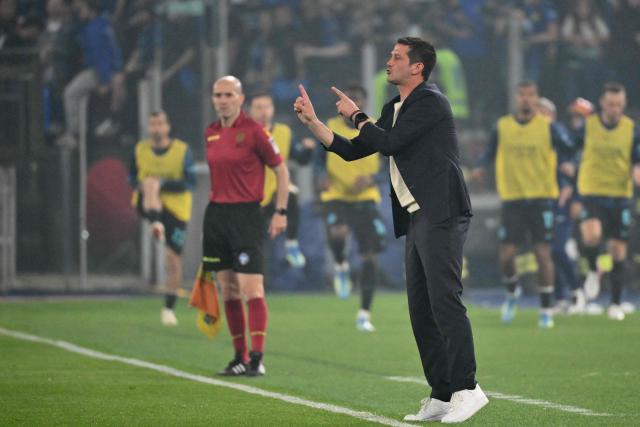Inter Milan's Romanian head coach Cristian Chivu gives instructions during the Italian Cup (Coppa Italia) final football match between Lazio Rome and Inter Milan at the Olympic stadium in Rome on May 13, 2026. (Photo by Alberto PIZZOLI / AFP)