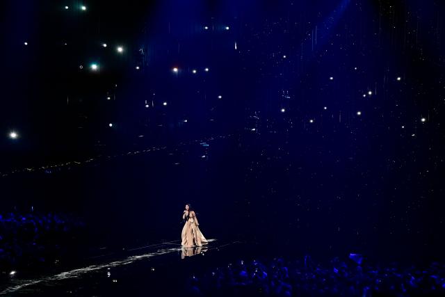 Luxembourgish singer-songwriter and violinist Eva Marija, representing Luxembourg with the song 'Mother Nature', performs during a dress rehearsal for the second semi-final of the Eurovision Song Contest 2026 (ESC) at Wiener Stadthalle in Vienna, Austria on May 13, 2026. (Photo by Tobias SCHWARZ / AFP)