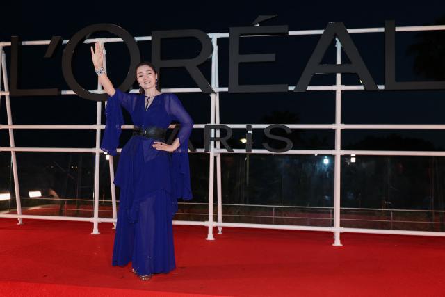 Chinese actress Gong Li arrives for the L’Oreal Paris Women of Worth Dinner on the sidelines of the 79th edition of the Cannes Film Festival in Cannes, southern France, on May 13, 2026. (Photo by Sameer AL-DOUMY / AFP)