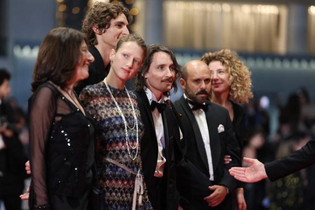 (From L) Italian Producer Enrica Capra, Italian actress Yile Yara Vianello, French actor Vassili Schneider, French director Berenger Thouin, French actor Pierre-Antoine Billon and French producer Carine Ruszniewski arrive for the screening of the film "L'Age d'or" (The Golden Age) at the 79th edition of the Cannes Film Festival in Cannes, southern France on May 13, 2026. (Photo by Thibaud MORITZ / AFP)