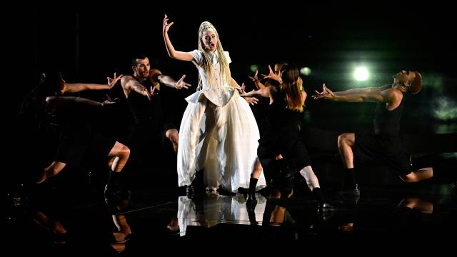 France's singer Monroe Vata Rigby, aka Monroe and representing France with the song 'Regarde !', performs during a dress rehearsal for the second semi-final of the Eurovision Song Contest 2026 (ESC) at Wiener Stadthalle in Vienna, Austria on May 13, 2026. (Photo by Tobias SCHWARZ / AFP)