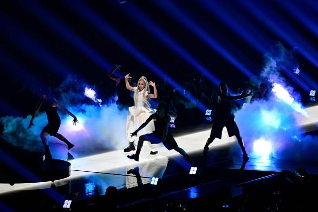 France's singer Monroe Vata Rigby, aka Monroe and representing France with the song 'Regarde !', performs during a dress rehearsal for the second semi-final of the Eurovision Song Contest 2026 (ESC) at Wiener Stadthalle in Vienna, Austria on May 13, 2026. (Photo by Tobias SCHWARZ / AFP)