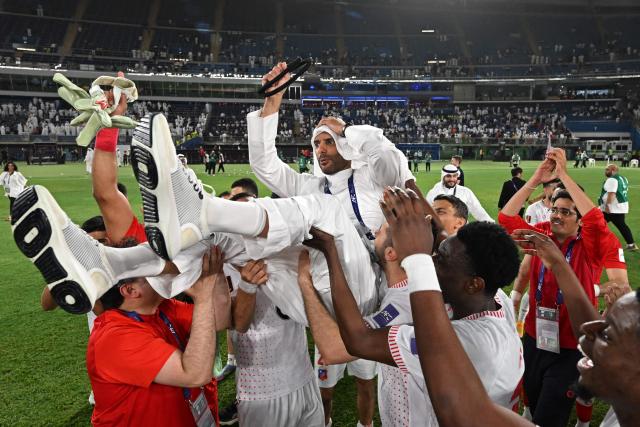 Kuwait SC's players celebrate their victory at the end of the AFC Challenge League final football match between Kuwait SC and Svay Rieng at the Jaber Al-Mubarak Al-Hamad Stadium in Kuwait City on May 13, 2026. (Photo by Yasser Al-Zayyat / AFP)