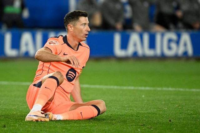 Barcelona's Polish forward #09 Robert Lewandowski reacts during the Spanish league football match between Deportivo Alaves and FC Barcelona at Mendizorroza Stadium in Vitoria on May 13, 2026. (Photo by ANDER GILLENEA / AFP)