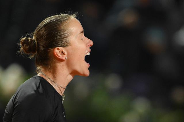 Ukraine's Elina Svitolina celebrates after winning against Kazakhstan's Elena Rybakina during the ATP Rome Open tennis tournament at Foro Italico in Rome on May 13, 2026. (Photo by Tiziana FABI / AFP)