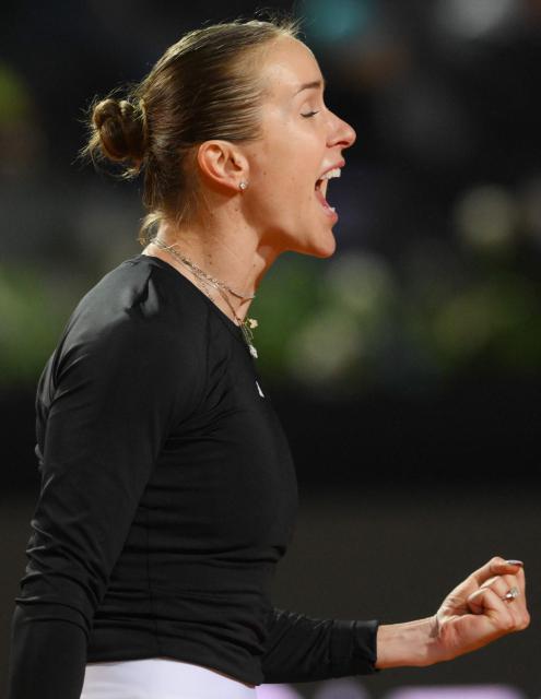 Ukraine's Elina Svitolina celebrates after winning against Kazakhstan's Elena Rybakina during the ATP Rome Open tennis tournament at Foro Italico in Rome on May 13, 2026. (Photo by Tiziana FABI / AFP)