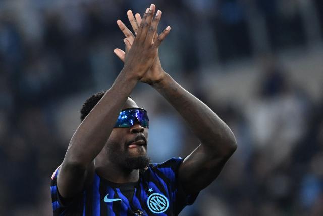 Inter Milan's French forward #09 Marcus Thuram celebrates after Inter won the Italian Cup (Coppa Italia) final football match between Lazio Rome and Inter Milan at the Olympic stadium in Rome on May 13, 2026. (Photo by Isabella BONOTTO / AFP)
