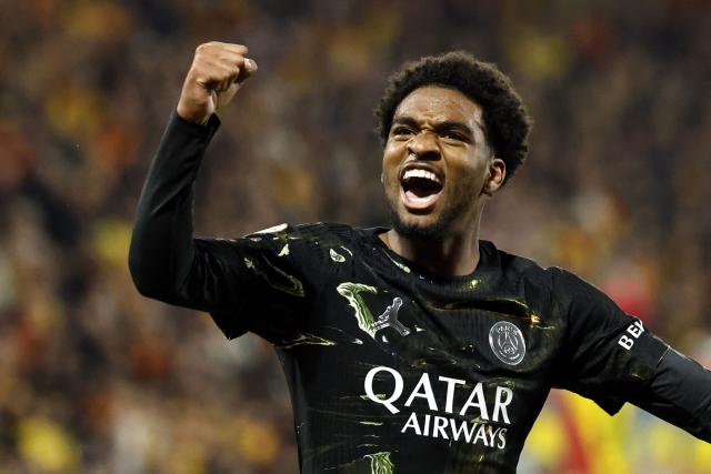 Paris Saint-Germain's French forward #49 Ibrahim Mbaye celebrates after scoring a goal during the French L1 football match between RC Lens and Paris Saint-Germain (PSG) at the Stade Bollaert-Delelis stadium in Lens on May 13, 2026. (Photo by SIMON WOHLFAHRT / AFP)