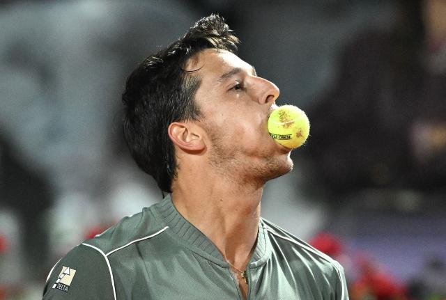 Italy's Luciano Darderi reacts during the match against Spain's Rafael Jodar during the ATP Rome Open tennis tournament at Foro Italico in Rome on May 13, 2026. (Photo by Tiziana FABI / AFP)