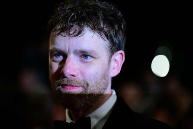 French actor Antoine Reinartz leaves after the screening of the film "L'Abandon" at the 79th edition of the Cannes Film Festival in Cannes, southern France on May 13, 2026. (Photo by Olivier CHASSIGNOLE / AFP)