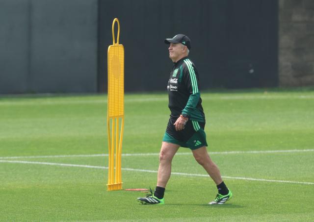 Mexico's head coach Javier Aguirre walks on the pitch during a training session at the high-performance centre in Mexico City May 13, 2026. Mexico will play three friendly matches, against Ghana, Australia and Serbia, before the start of the 2026 FIFA world cup. (Photo by LUIS CORTES / AFP)