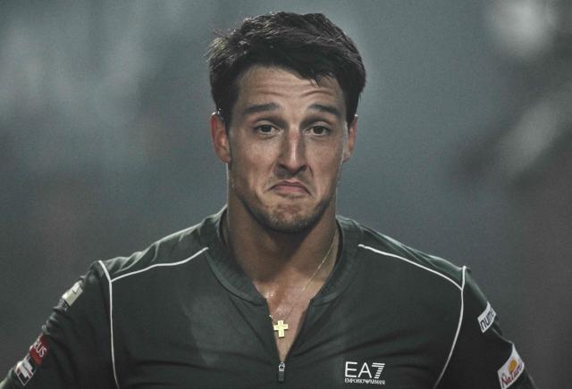 Italy's Luciano Darderi reacts during the match against Spain's Rafael Jodar during the ATP Rome Open tennis tournament at Foro Italico in Rome on May 13, 2026. (Photo by Tiziana FABI / AFP)