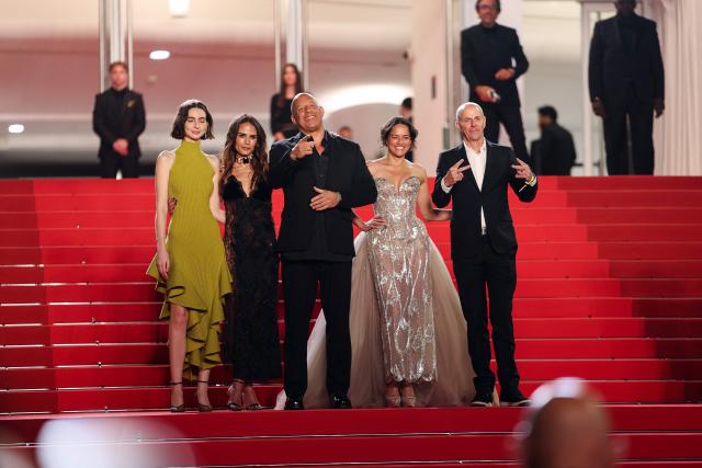 (From L) US model and actress Meadow Rain Walker, US actress Jordana Brewster, US actor Vin Diesel, US actress Michelle Rodriguez and US producer Neal Moritz arrive for the screening of the film "The Fast and the Furious" at the 79th edition of the Cannes Film Festival in Cannes, southern France on May 13, 2026. (Photo by Sameer AL-DOUMY / AFP)