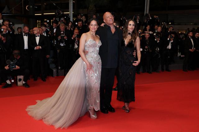 (From L) US actress Michelle Rodriguez, US actor Vin Diesel and US actress Jordana Brewster arrive for the screening of the film "The Fast and the Furious" at the 79th edition of the Cannes Film Festival in Cannes, southern France on May 13, 2026. (Photo by Sameer AL-DOUMY / AFP)