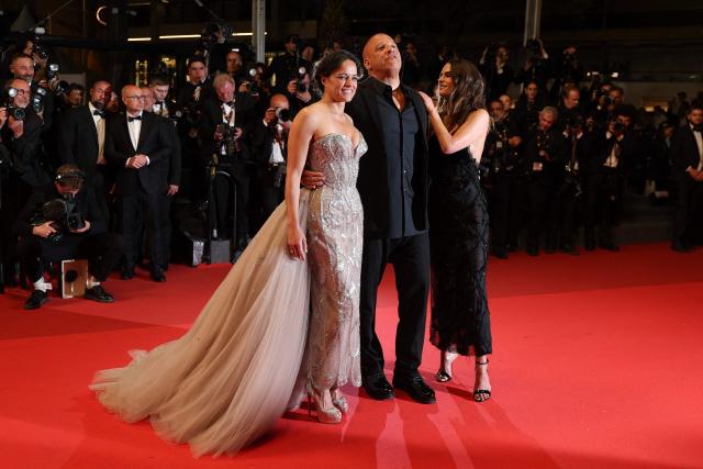 (From L) US actress Michelle Rodriguez, US actor Vin Diesel and US actress Jordana Brewster arrive for the screening of the film "The Fast and the Furious" at the 79th edition of the Cannes Film Festival in Cannes, southern France on May 13, 2026. (Photo by Sameer AL-DOUMY / AFP)