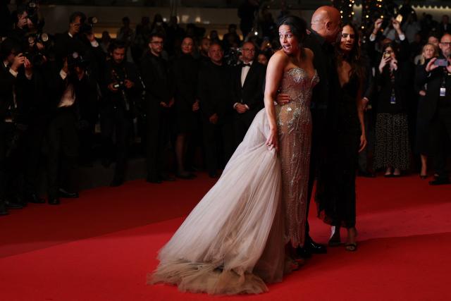 (From L) US actress Michelle Rodriguez, US actor Vin Diesel and US actress Jordana Brewster arrive for the screening of the film "The Fast and the Furious" at the 79th edition of the Cannes Film Festival in Cannes, southern France on May 13, 2026. (Photo by Sameer AL-DOUMY / AFP)