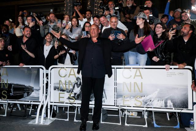 US actor Vin Diesel reacts as he arrives for the screening of the film "The Fast and the Furious" at the 79th edition of the Cannes Film Festival in Cannes, southern France on May 13, 2026. (Photo by Sameer AL-DOUMY / AFP)