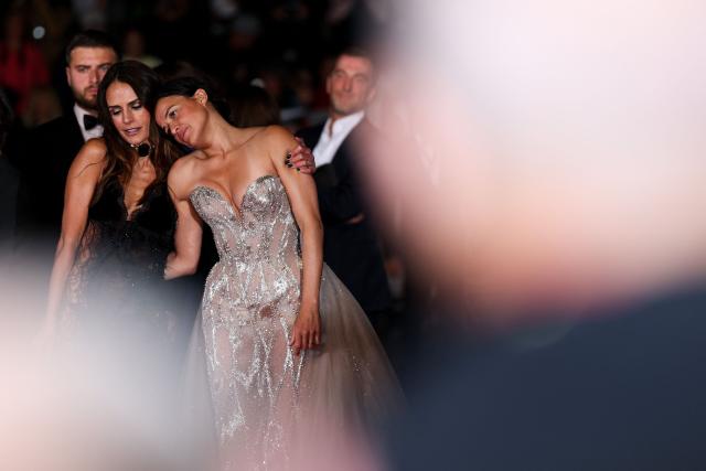 US actress Jordana Brewster and US actress Michelle Rodriguez react as they arrive for the screening of the film "The Fast and the Furious" at the 79th edition of the Cannes Film Festival in Cannes, southern France on May 13, 2026. (Photo by Sameer AL-DOUMY / AFP)