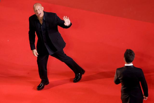 US actor Vin Diesel reacts as he arrive for the screening of the film "The Fast and the Furious" at the 79th edition of the Cannes Film Festival in Cannes, southern France on May 13, 2026. (Photo by Ian LANGSDON / AFP)