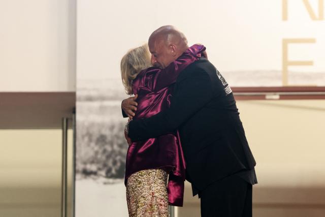 US actor Vin Diesel (R) embraces German media executive and President of the Cannes Film Festival Iris Knobloch upon arrival for the screening of the film "The Fast and the Furious" at the 79th edition of the Cannes Film Festival in Cannes, southern France on May 13, 2026. (Photo by Thibaud MORITZ / AFP)